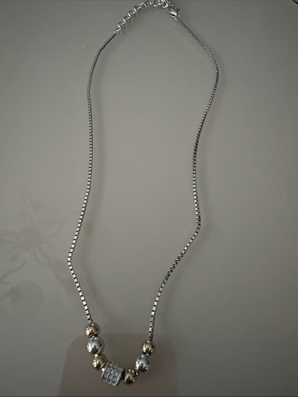 Two-Tone Silver and Gold Bead Necklace with Pavé Center from Brighton.